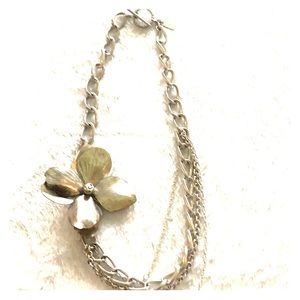 Silver necklace with metal flower